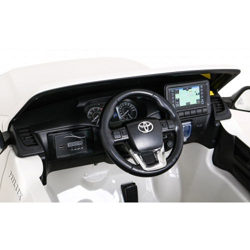 Toyota Hilux na akumulator dla dzieci Biały Pickup + Napęd 4x4 + Pilot + 2 bagażniki