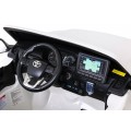 Toyota Hilux na akumulator dla dzieci Biały Pickup + Napęd 4x4 + Pilot + 2 bagażniki