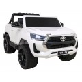 Toyota Hilux na akumulator dla dzieci Biały Pickup + Napęd 4x4 + Pilot + 2 bagażniki